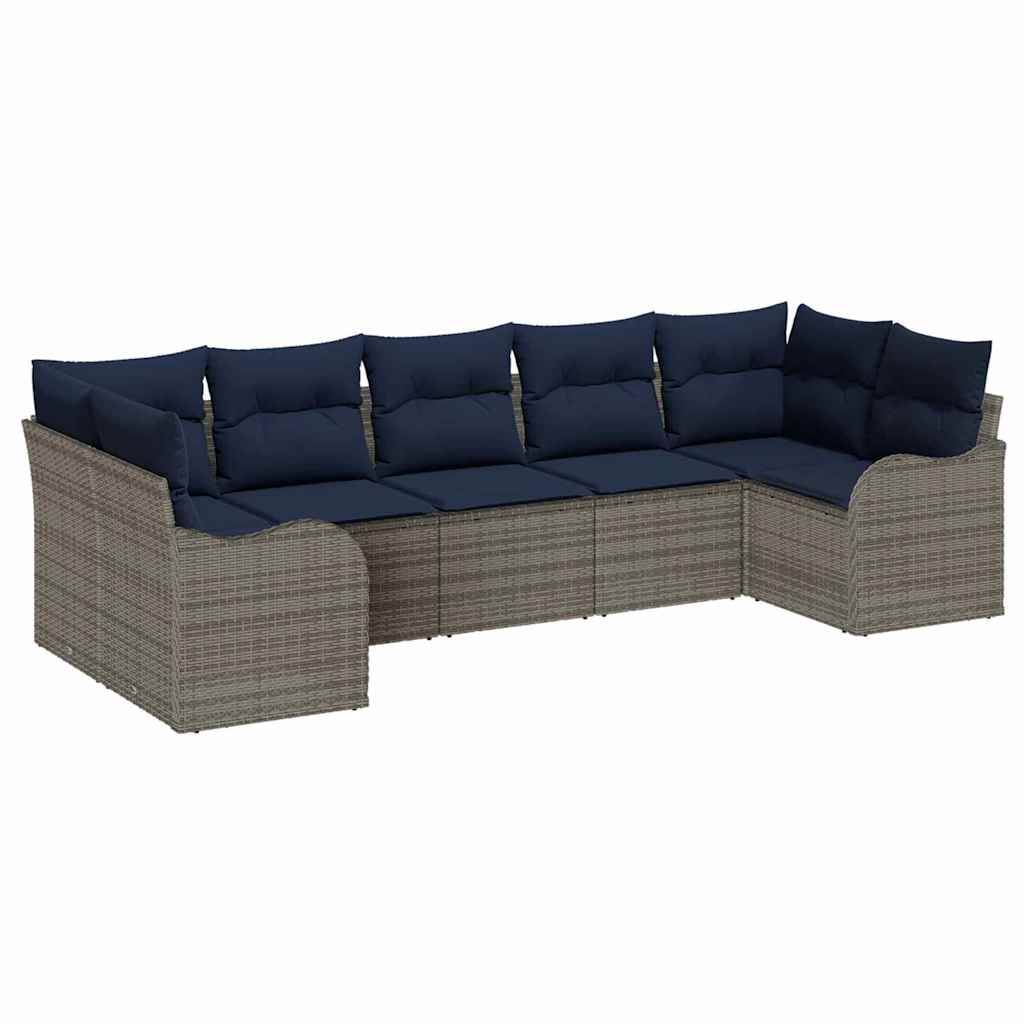 Modulares Gartensofaset mit gewebtem grauem Gestell und marineblauen Kissen auf weißem Hintergrund.