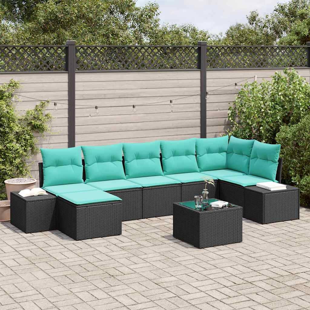 Gartenmöbel-Set für die Terrasse mit schwarzem Rattansektional, türkisfarbenen Kissen und passendem Kaffee- und Beistelltisch auf einer gepflasterten Terrasse.
