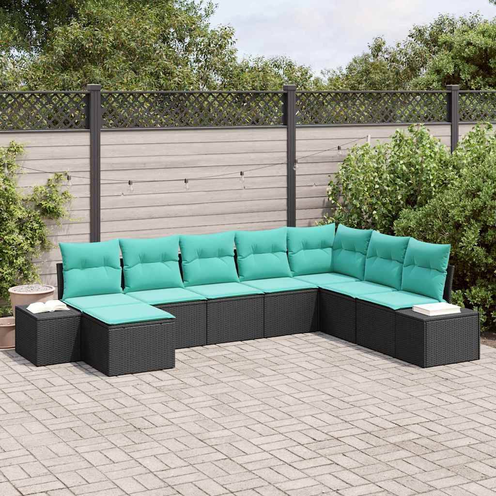 Terrasse im Freien mit schwarzem Rattan-Sitzkombination und türkisfarbenen Kissen, in L-Form neben einem Zaun und Begrünung angeordnet.