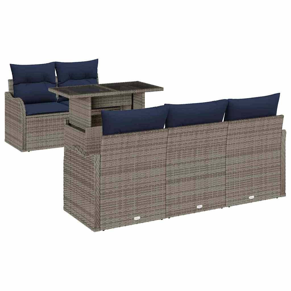 Outdoor-Rattangarnitur mit Ecksofa und marineblauen Sitzkissen sowie passendem Tisch, auf weißem Hintergrund dargestellt.