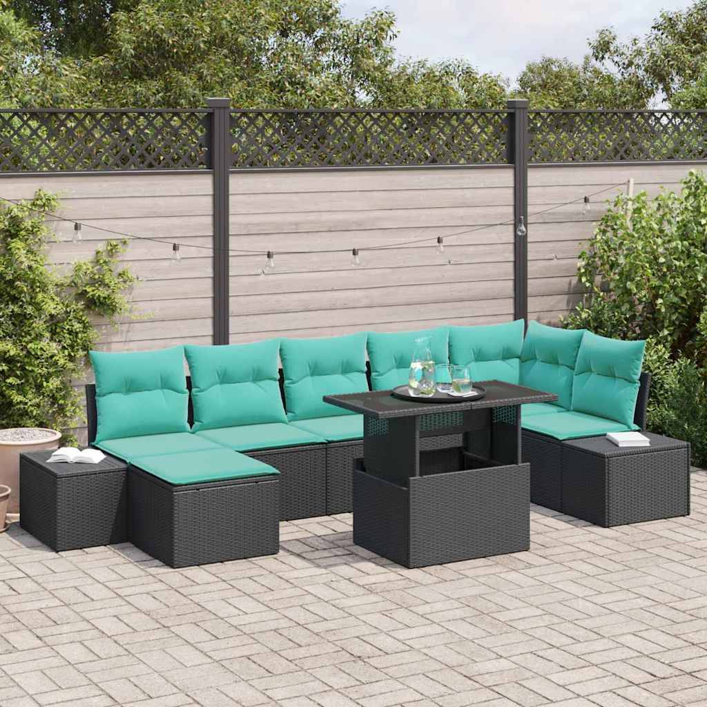 Outdoor-Sitzmöbel-Set mit türkisfarbenen Kissen und schwarz geflochtenem Mobiliar, das um einen zentralen Tisch in einem eingezäunten Garten angeordnet ist.