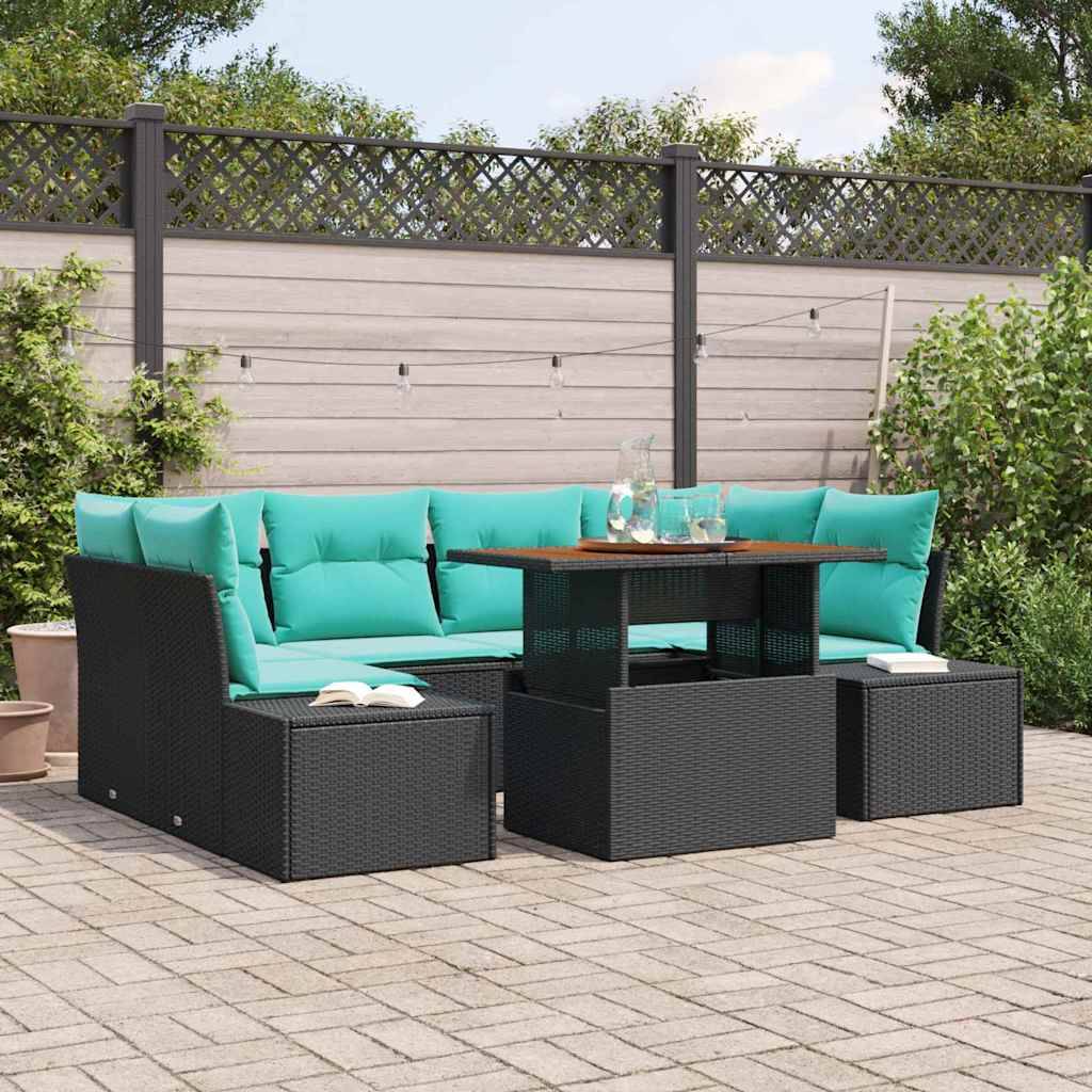 Outdoor-Terrassenmöbel-Set mit türkisfarbenen Kissen und schwarzen Rattanstühlen um einen dunklen Tisch auf einer gepflasterten Terrasse.