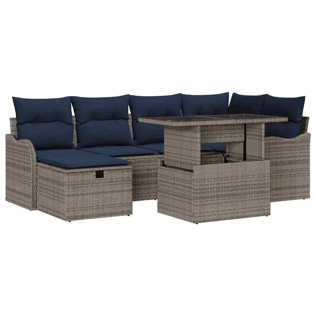 Braunes Rattan-Außensektionalsofa mit marineblauen Kissen und passendem Tisch, angeordnet als Terrassenmöbelset.
