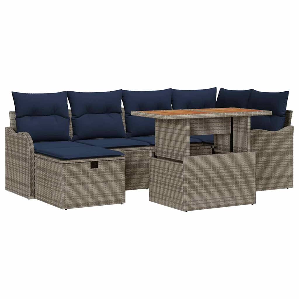 Outdoor-Polyrattan-Ecksofa-Set mit blauen Kissen und passendem Tisch.