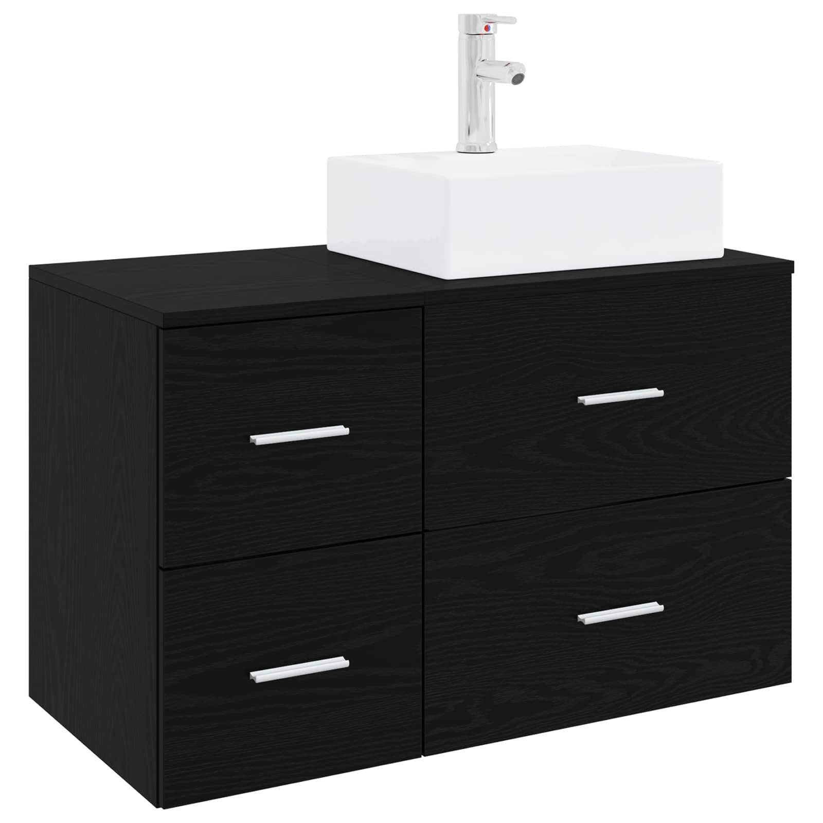 Schwarzes Badezimmerunterschrank mit vier Schubladen, weißem Waschbecken und Chromarmatur oben.