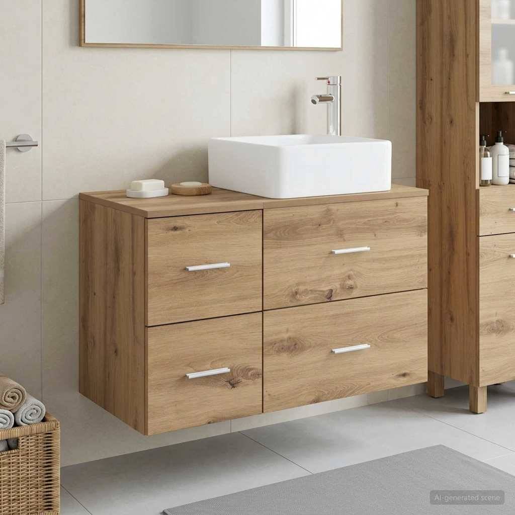 Holzwaschbeckenunterschrank mit vier Schubladen und weißem Aufsatzwaschbecken in einem modernen gekachelten Badezimmer.