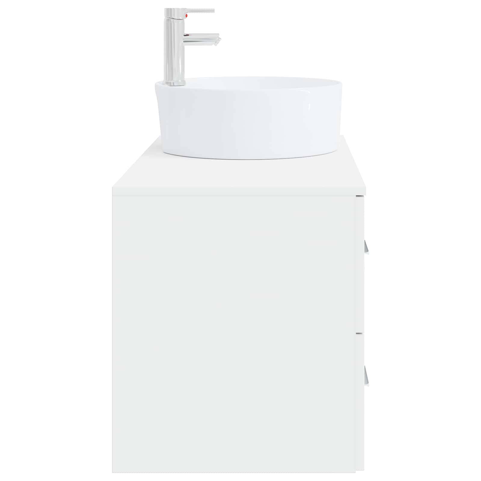 Weiße freistehende Badezimmerwaschkommode mit integriertem rundem Waschbecken und Einhebelmischer.