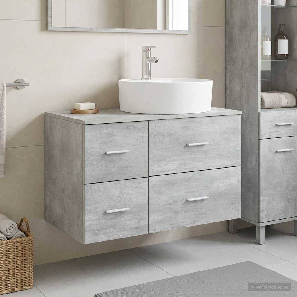 Modernes Badezimmer-Waschtisch mit rundem weißem Aufsatzwaschbecken auf einem grauem Holzschrank, neben einem Spiegel und einer passenden Aufbewahrungseinheit.