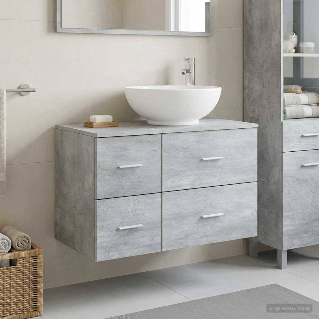 Modernes Badezimmer-Waschtisch mit weißem Aufsatzwaschbecken auf einem grauen wandmontierten Schrank, neben einem Handtuchkorb und Regalen.
