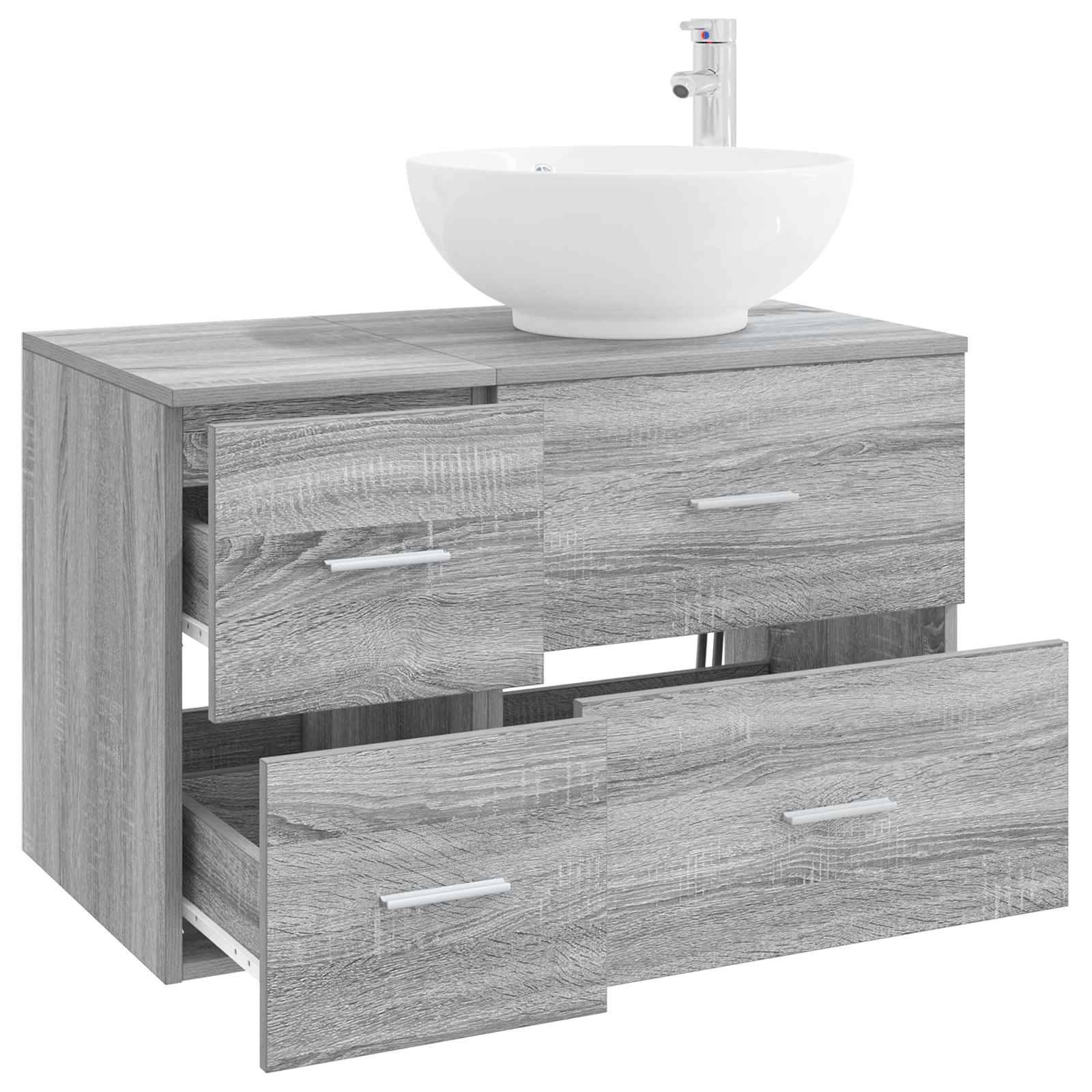 Grauer Holz-Waschtisch im Badezimmer mit weißem Aufsatzwaschbecken und Armatur, dargestellt mit zwei offenen Schubladen, die den Stauraum zeigen.