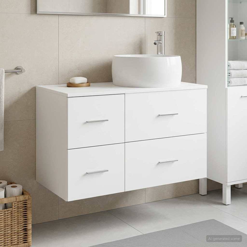 Modernes Badezimmer-Waschtisch mit weiß hängendem Schrank, vier Schubladen und rundem weißem Waschbecken vor beiger Fliesenwand.