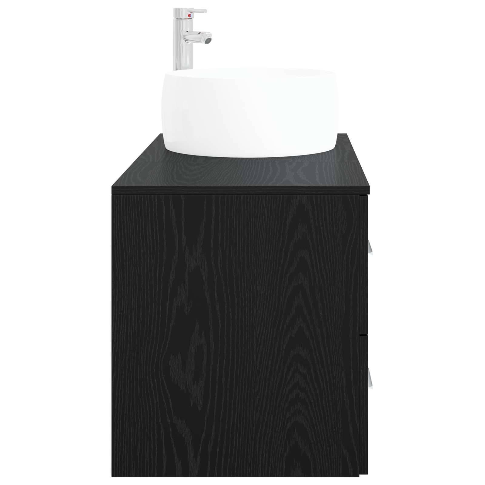Schwarzes Badezimmer-Waschtisch mit Holzmaserung, weißem Aufsatzwaschbecken und Chromarmatur.