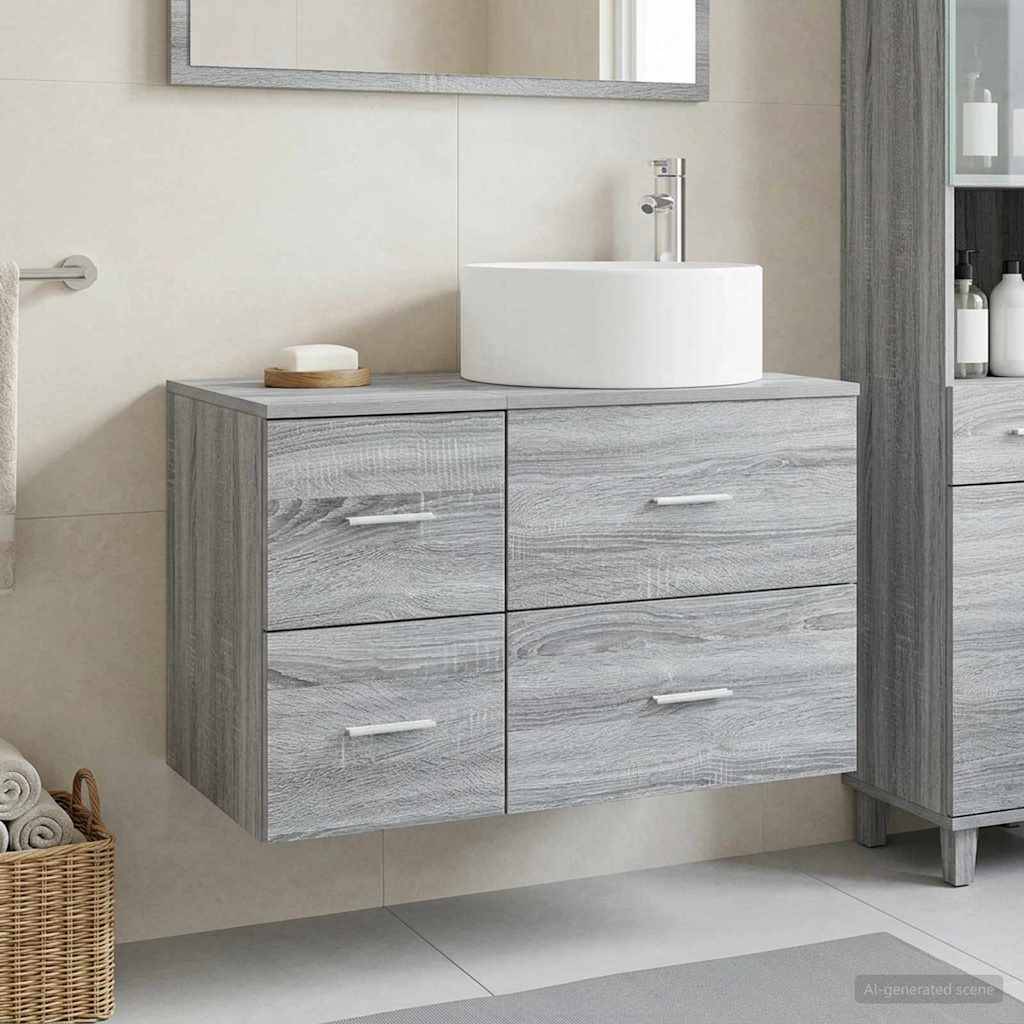 Schwebende graue Holzbadezimmer-Waschtischanlage mit vier Schubladen, weißes Aufsatzwaschbecken und Wandspiegel in einem modernen Badezimmer.