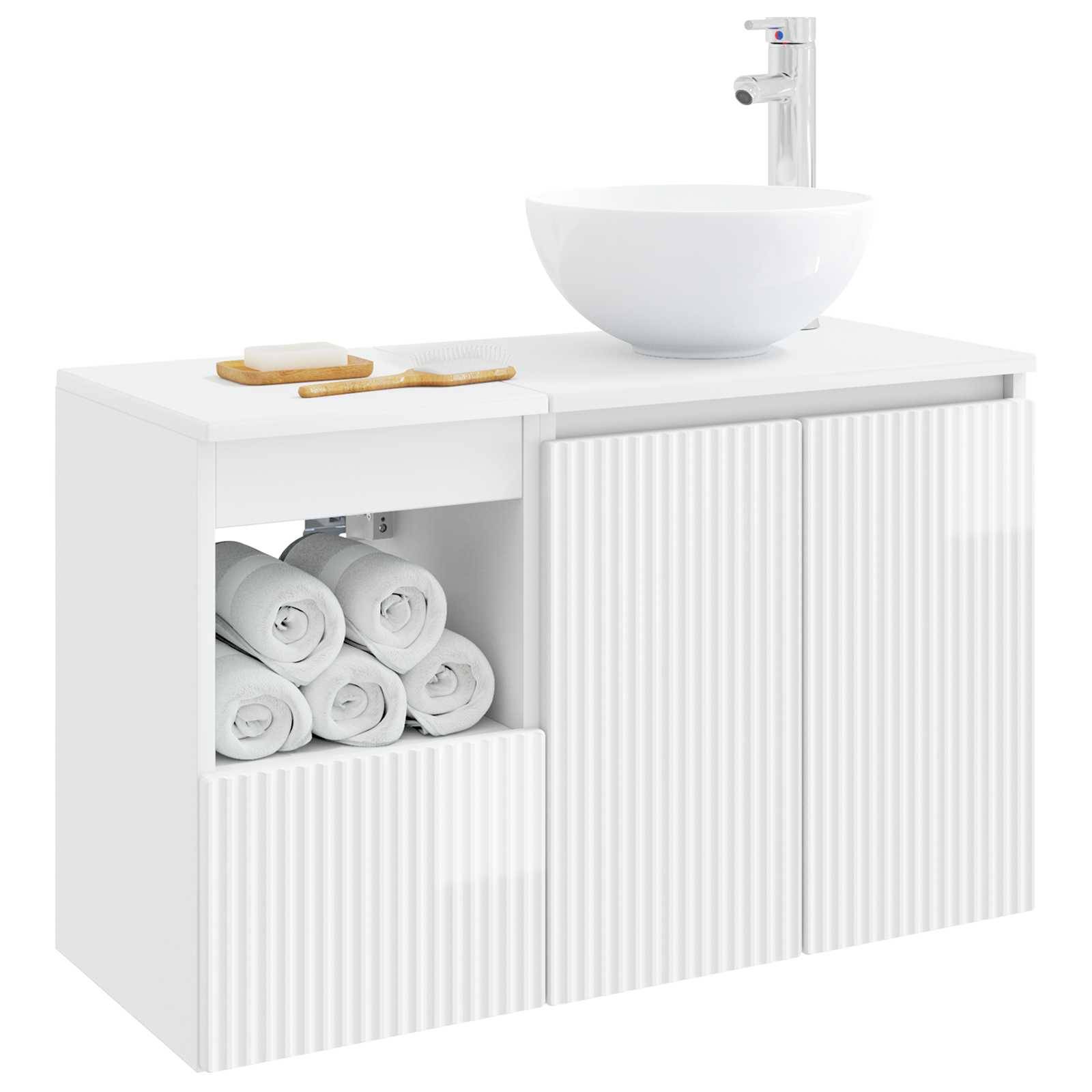 Weißer Badezimmerschrank mit rundem Waschbecken und Armatur; offenes Regal lagert aufgerollte Handtücher, und eine Seifenschale sowie eine Zahnbürsteablage stehen oben auf.