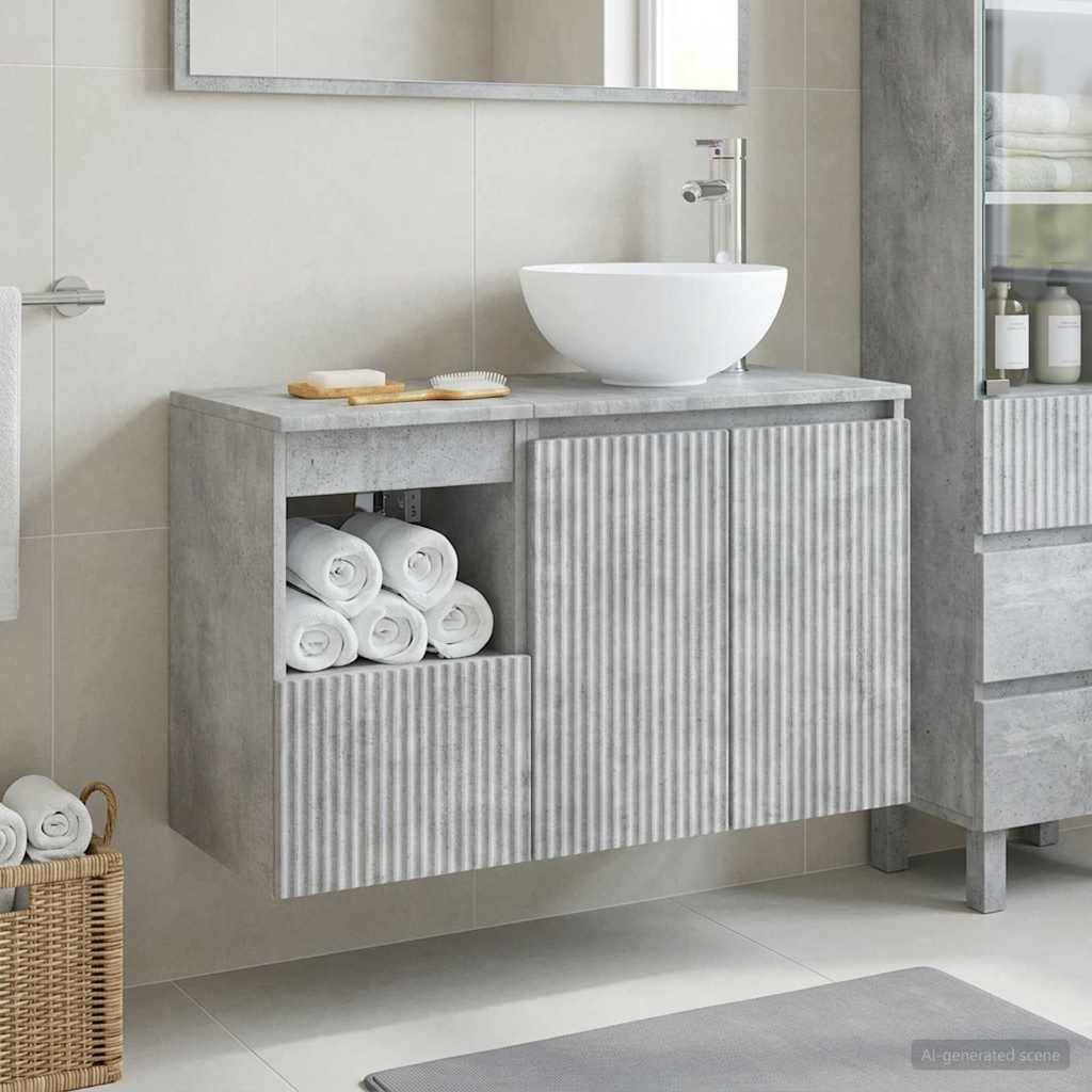 Modernes Badezimmermöbel mit rundem weißem Waschbecken, geriffelten Schranktüren und offenen Regalen, auf denen aufgerollte Handtücher und Seifenstücke angeordnet sind.