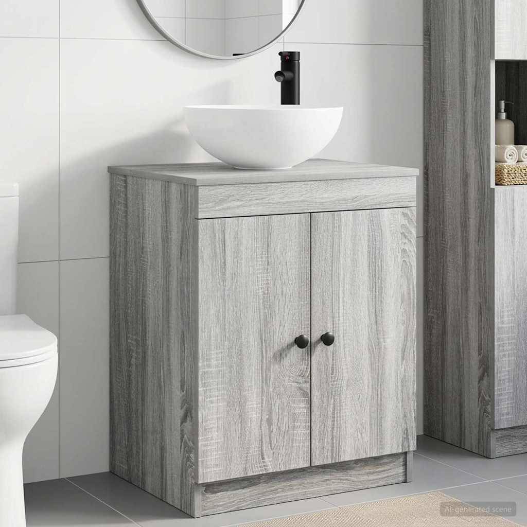 Badezimmerschrank mit Waschtischanlage aus hellem Holz, weißem Aufsatzbecken und schwarzer Armatur vor gekachelter Wand