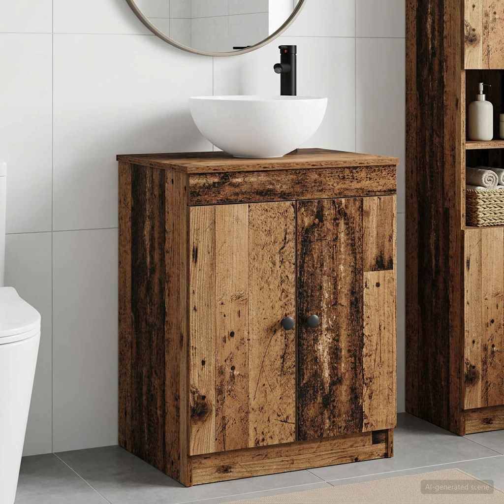 Holzwaschtischschrank im Badezimmer mit weißem Aufsatzwaschbecken und schwarzem Wasserhahn, gezeigt in einem gefliesten Badezimmer neben einem Regal.