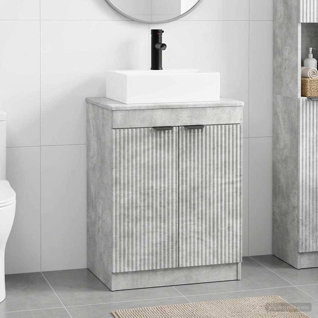 Modernes Badezimmerwaschtisch mit weißem Aufsatzwaschbecken, schwarzem Wasserhahn und grauem strukturiertem Schrank, zentriert vor gefliesten Wänden.