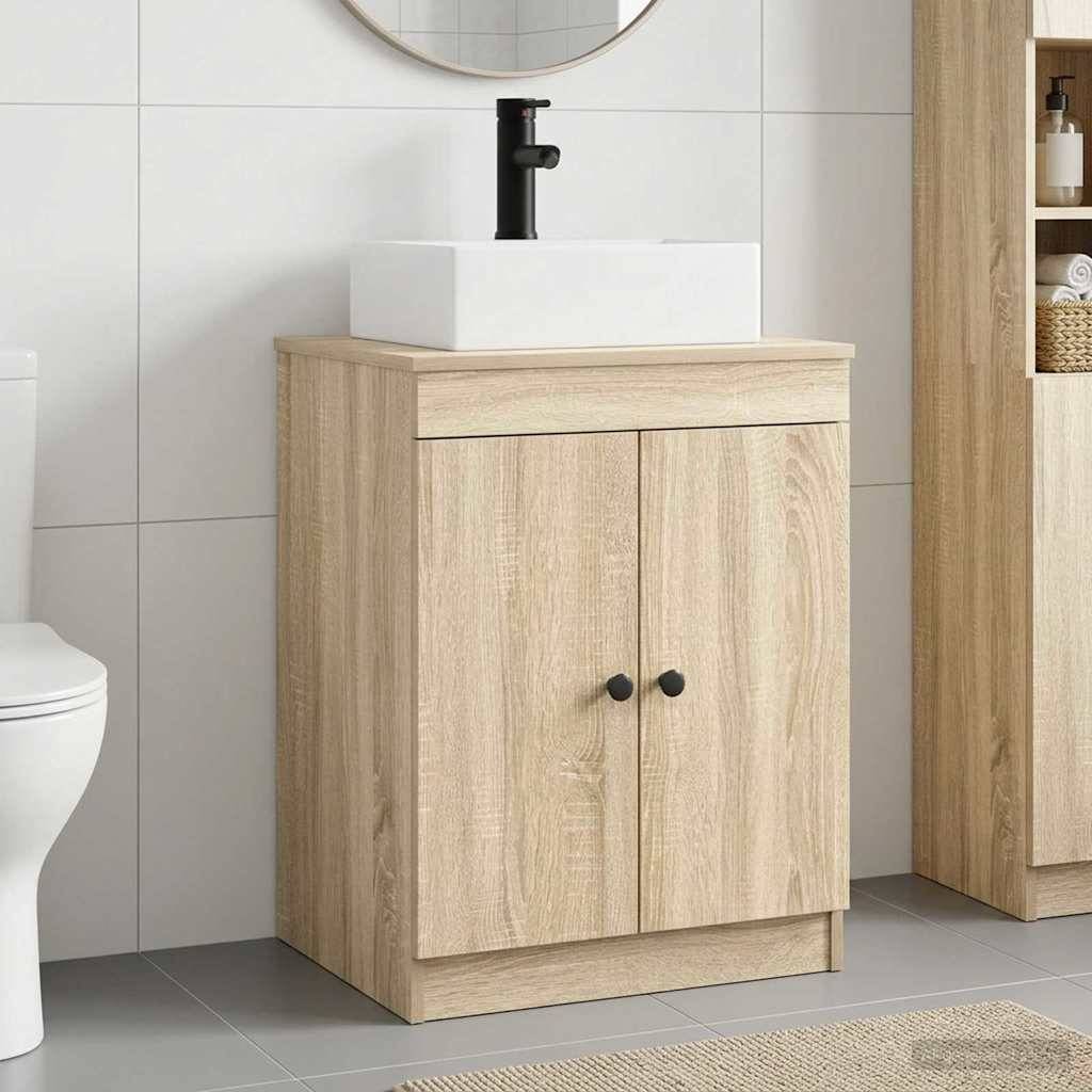 Helles Holz-Badezimmerwaschbecken mit weißem Aufsatzwaschbecken und schwarzem Wasserhahn, neben einer Toilette in einem modernen gekachelten Badezimmer.