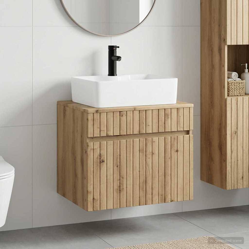 Schwimmende Holz-Badezimmerschrank mit weißem Aufsatzwaschbecken und schwarzem Wasserhahn neben einem runden Spiegel und passendem Wandschrank