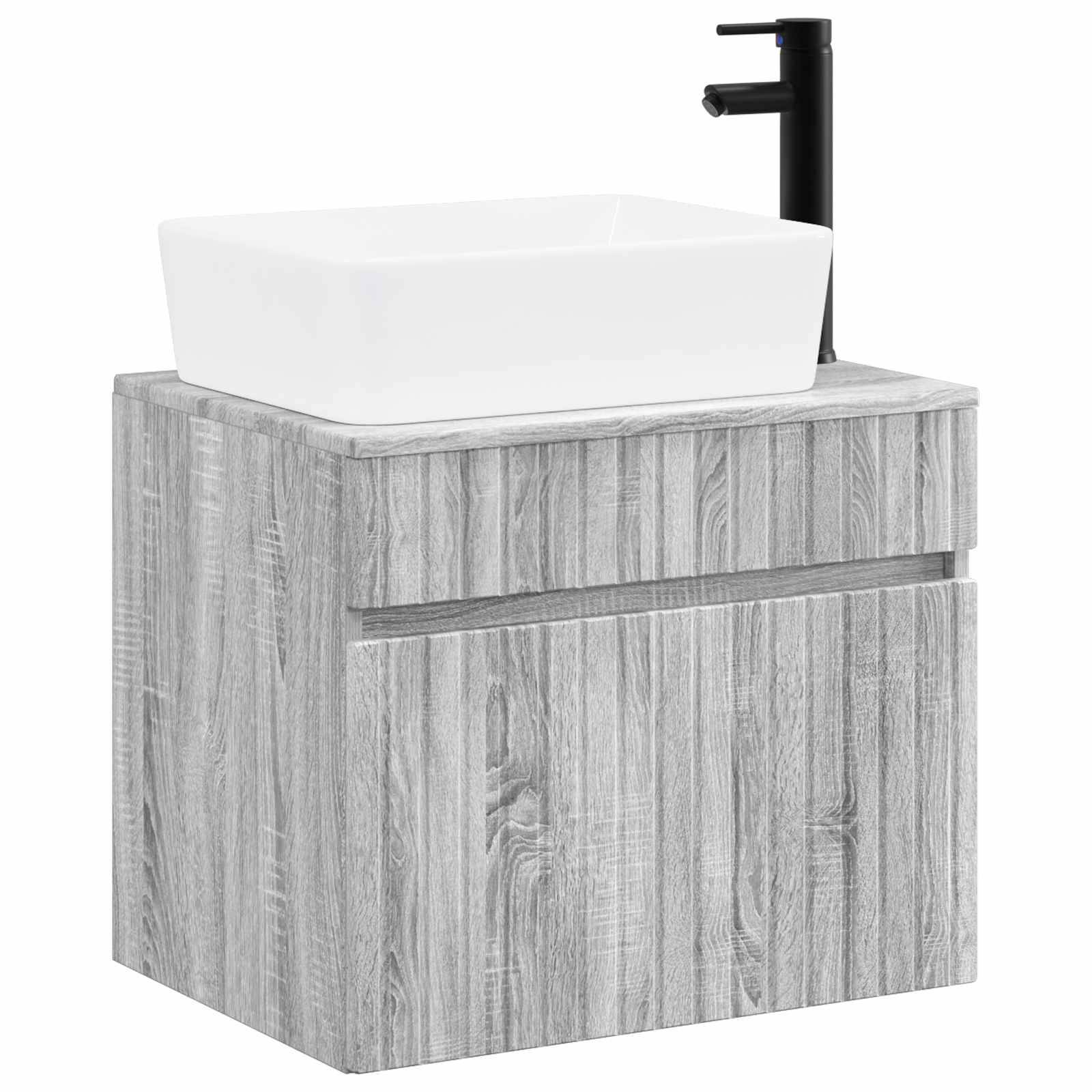 Modernes Badezimmerwaschtisch mit grauem Holzschrank, weißem Aufsatzwaschbecken und matter schwarzer Armatur auf weißem Hintergrund.