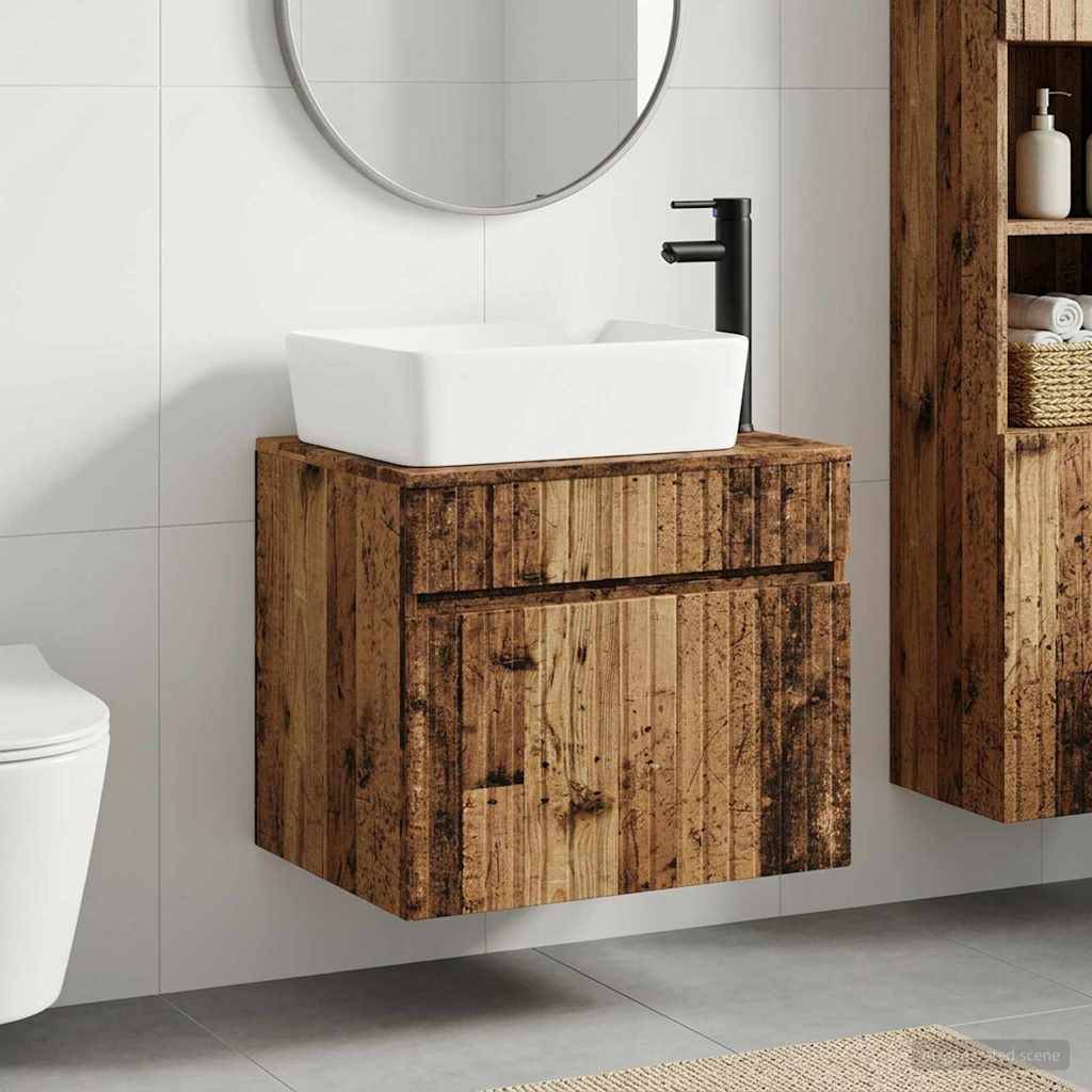 Badezimmerwaschbecken mit wandmontiertem rustikalem Holzschrank, weißem Aufsatzwaschbecken, schwarzem Wasserhahn und rundem Spiegel auf gefliester Wand.