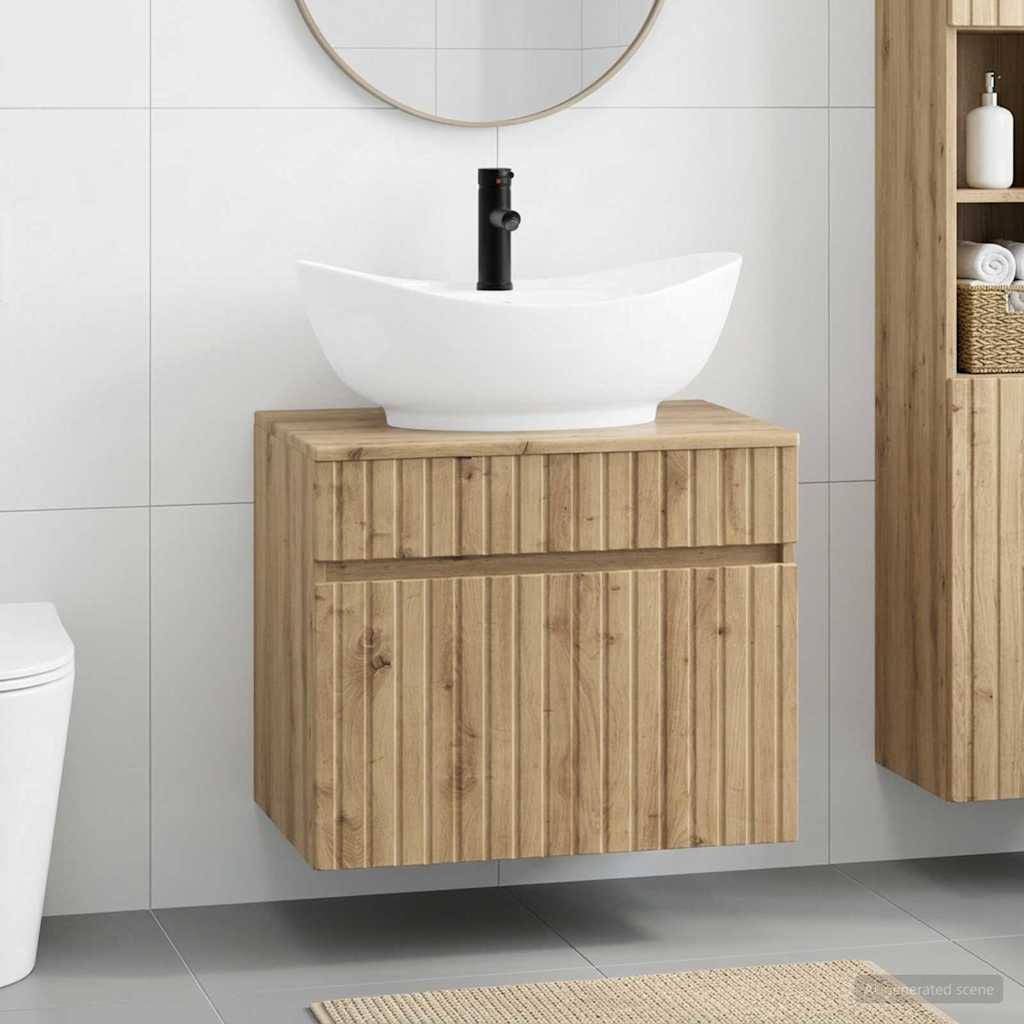 Modernes Badezimmervansittoir mit weißem Aufsatzwaschbecken, schwarzem Wasserhahn, rundem Spiegel und hellem Holzschrank an einer gefliesten Wand montiert.