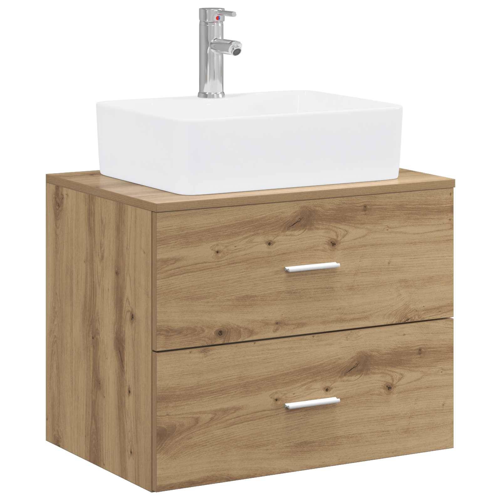 Holzwaschbeckenunterschrank im Badezimmer mit zwei Schubladen und weißem Aufsatzwaschbecken mit Chromarmatur.