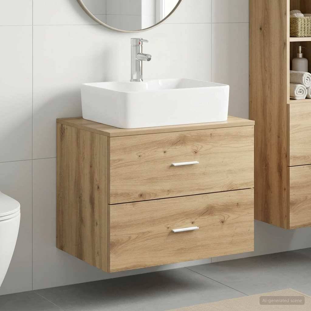 Schwebendes Holz-Badezimmermöbel mit weißem Aufsatzwaschbecken und Chromarmatur neben einer Toilette in einem modernen gefliesten Badezimmer.