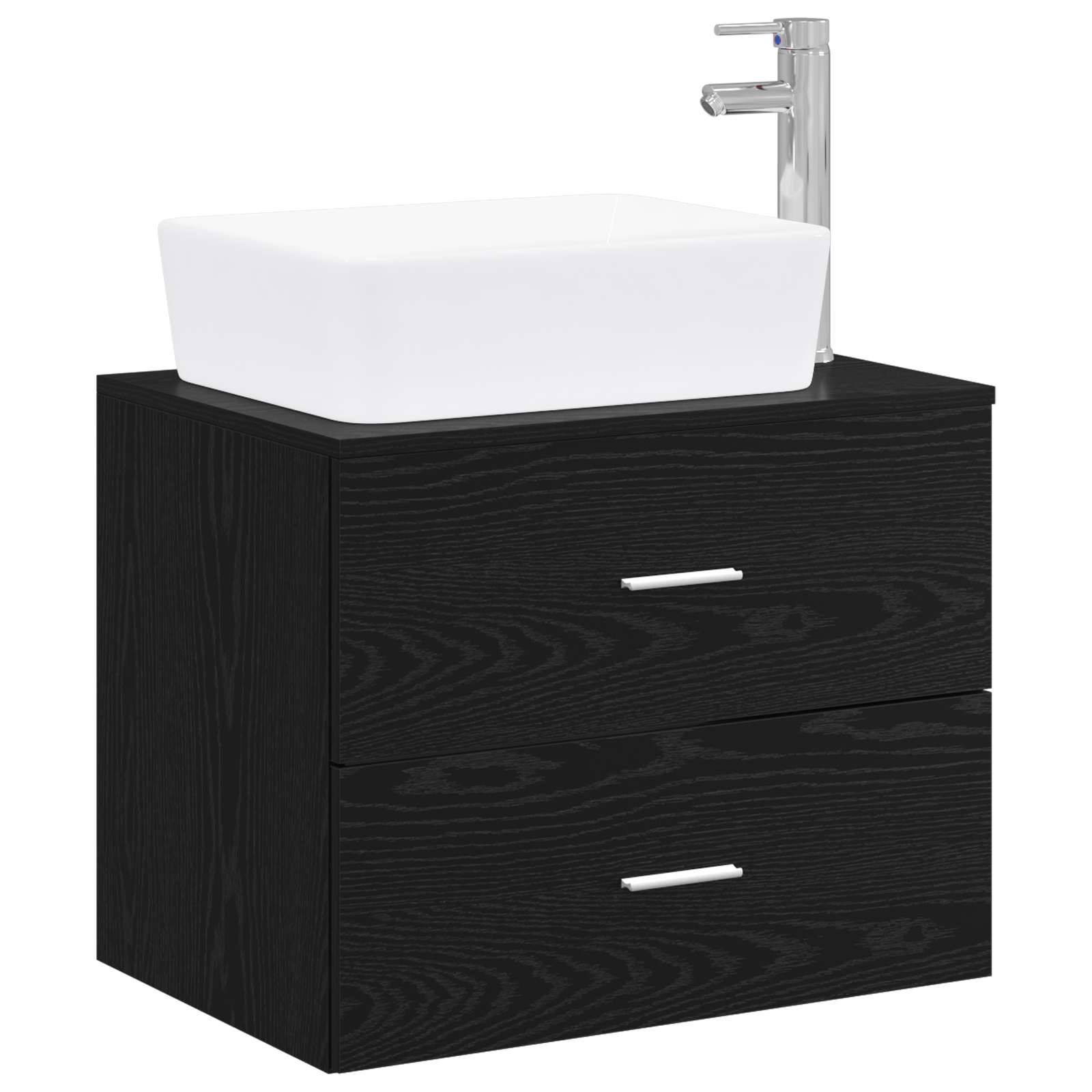 Moderner schwarzer Waschtischschrank mit zwei Schubladen, weißem Aufsatzwaschbecken und Chrom-Armatur auf weißem Hintergrund.