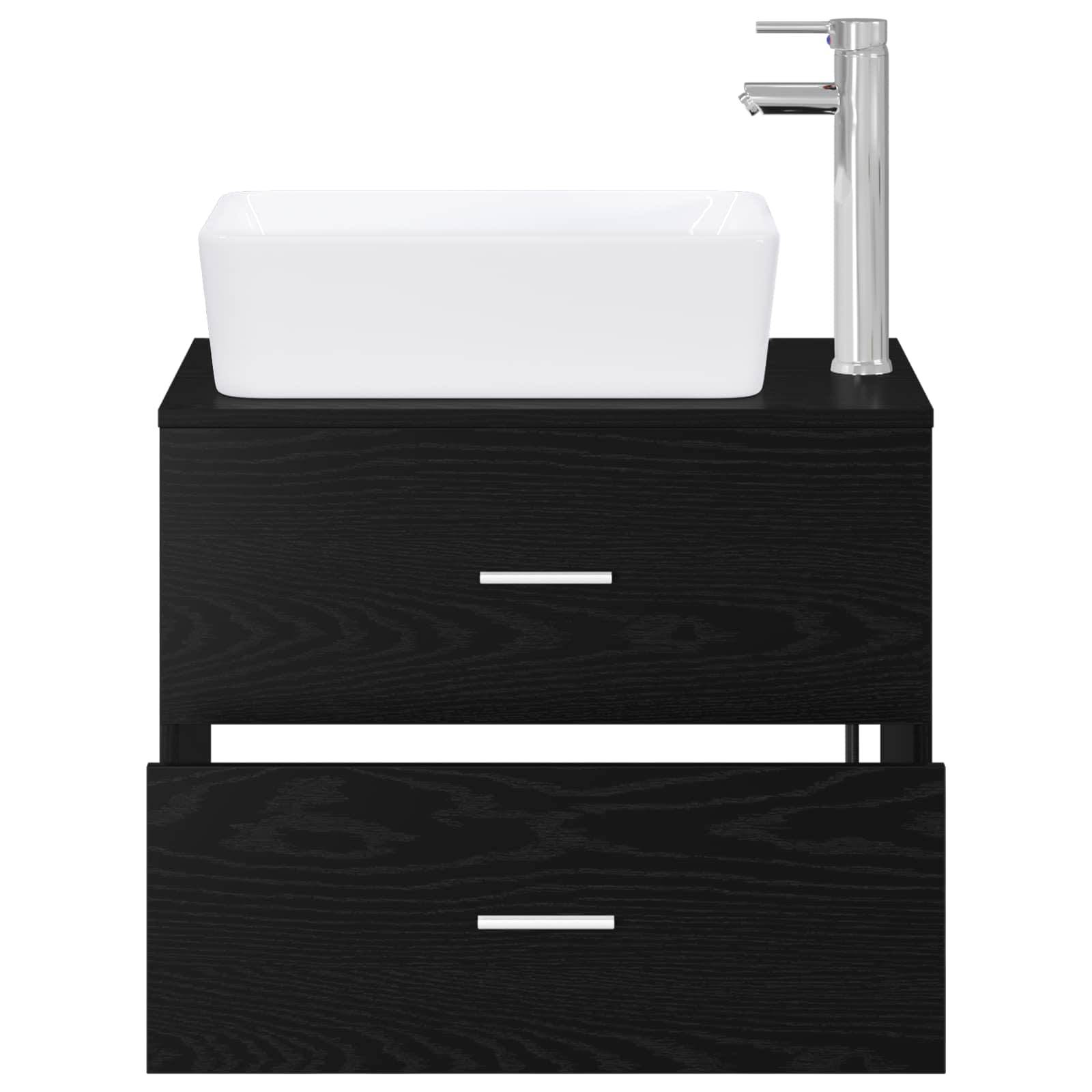 Schwarzes Badezimmer-Waschtischset mit weißem Becken und Chromarmatur, mit zwei Schubladen und einem offenen Regal unter dem Becken.
