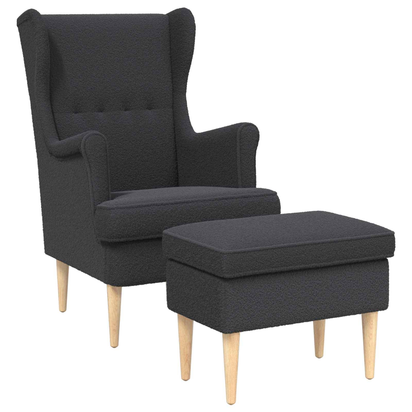 Schwarzer Wingback-Sessel mit passendem Ottomane, beide mit dunklem Stoff bezogen und hellen Holzbeinen.