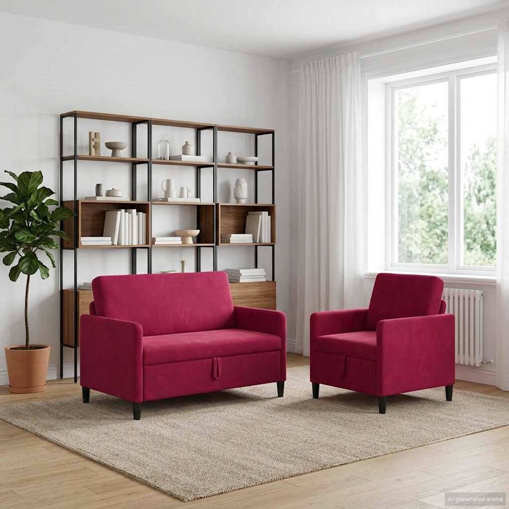 Modernes Wohnzimmer mit einem magentafarbenen Sofa und Sessel auf einem beigefarbenen Teppich, einer hohen Regaleinheit, einer Topfpflanze und einem hellen Fenster.