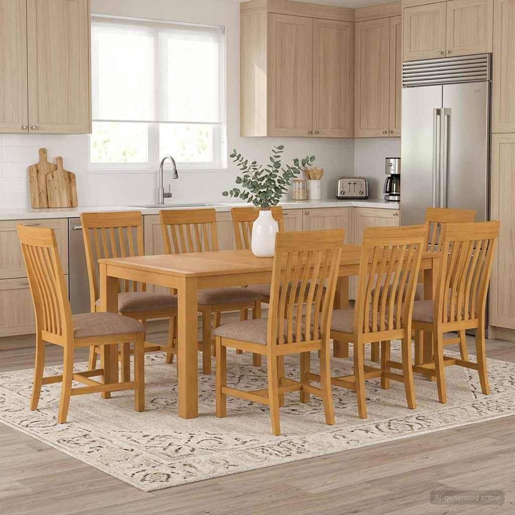Eine helle Küche mit einem Holzesstisch und acht passenden Stühlen auf einem gemusterten Teppich, mit hellem Holzschränken, einer Spüle und einem Edelstahlkühlschrank.