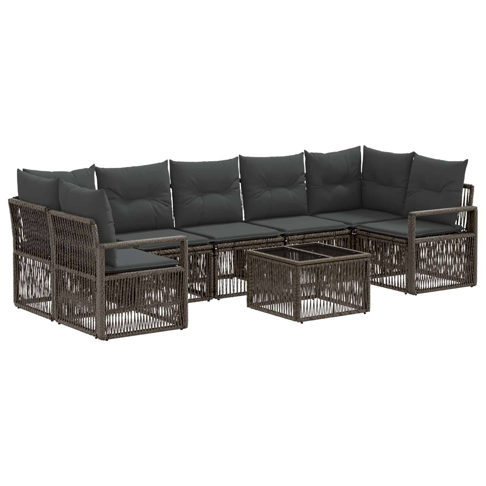 Braunes Rattan-Gartensektional-Sofa-Set mit dunklen Kissen und passendem Couchtisch auf weißem Hintergrund