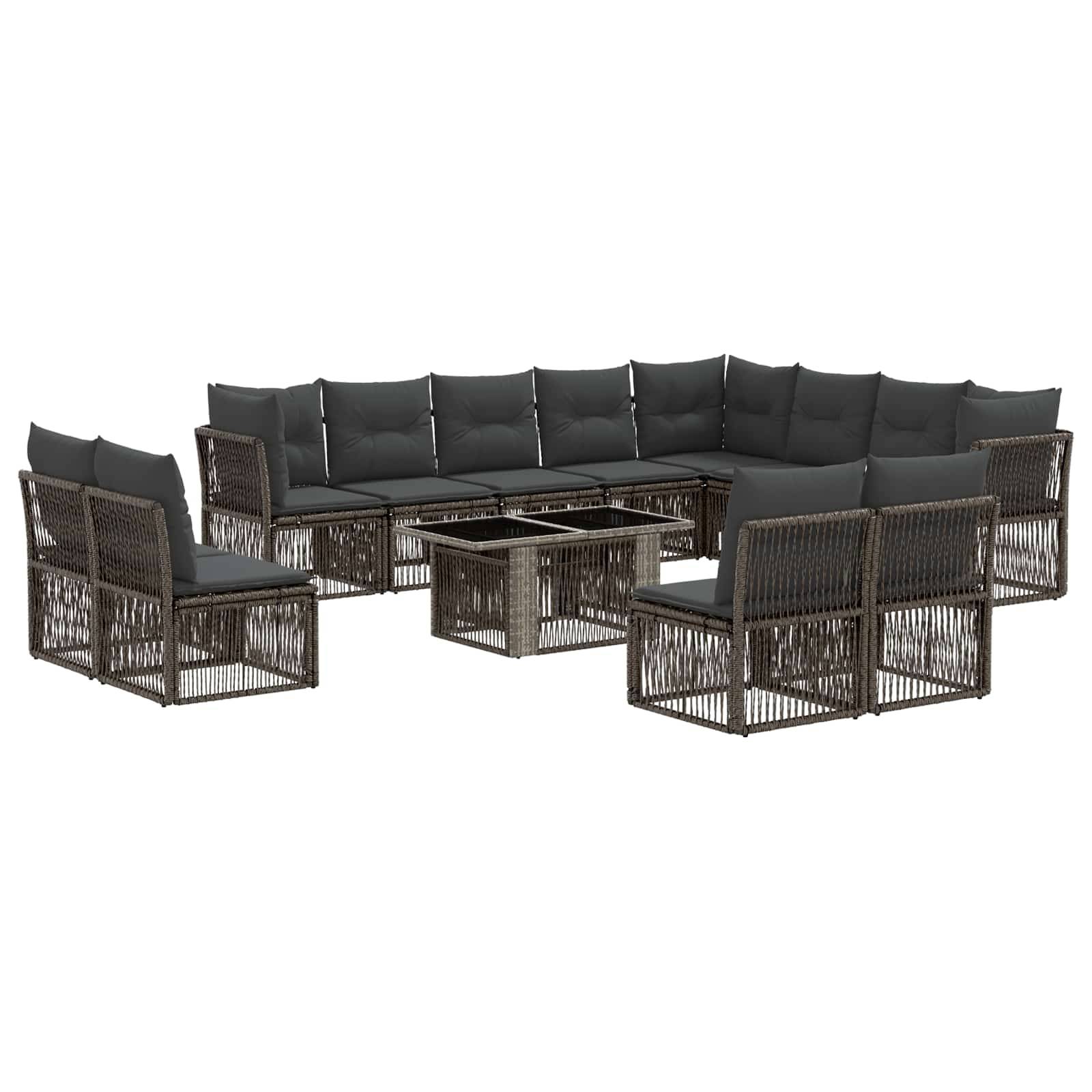 Outdoor-Korbgeflecht-Ecksofa für die Terrasse mit dunklen Kissen und passendem Glastisch mit Glasplatte