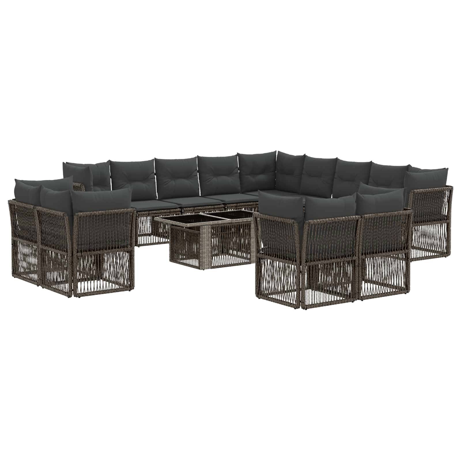 Modulares Outdoor-Loungemöbel-Set mit dunklem Rattangestell, schwarzen Polstern und passendem Glastisch.