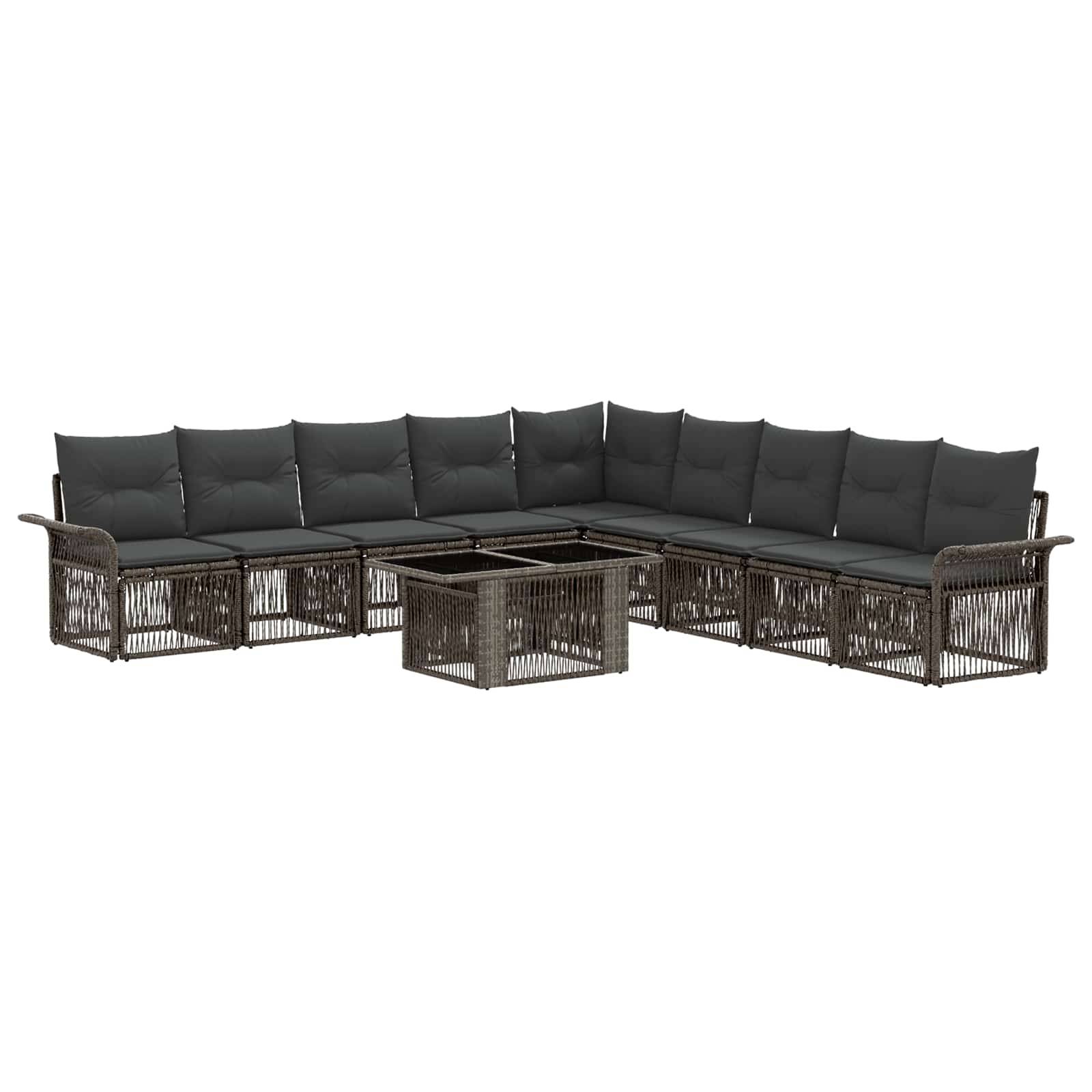 L-förmiges Außen-Ecksofa mit dunklen Kissen, Rattanrahmen und passendem Couchtisch auf weißem Hintergrund.