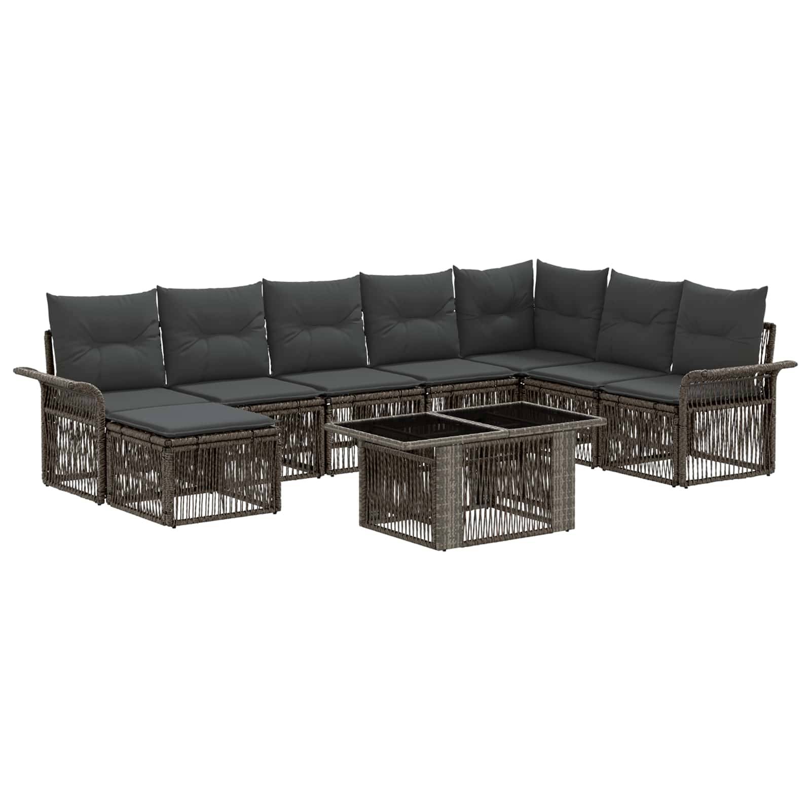 Dunkles Rattan L-förmiges Outdoor-Ecksofa mit schwarzen Kissen und passendem Couchtisch auf weißem Hintergrund.