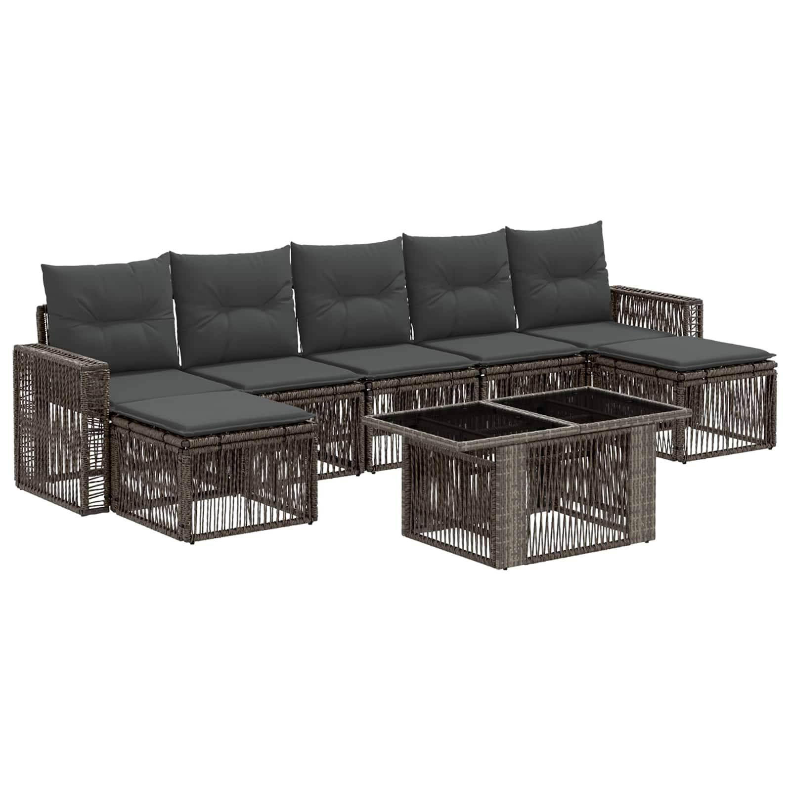 Gartensektional-Loungeset aus geflochtenem Rattan mit dunklen Kissen, Ottomane und Couchtisch auf weißem Hintergrund
