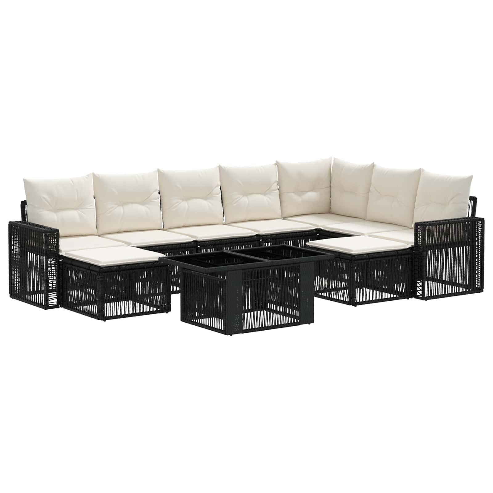Schwarzes Rattangeflecht L-förmiges Outdoor-Loungesofa mit cremefarbenen Kissen und passenden Tisch-Ottoman-Elementen auf weißem Hintergrund.