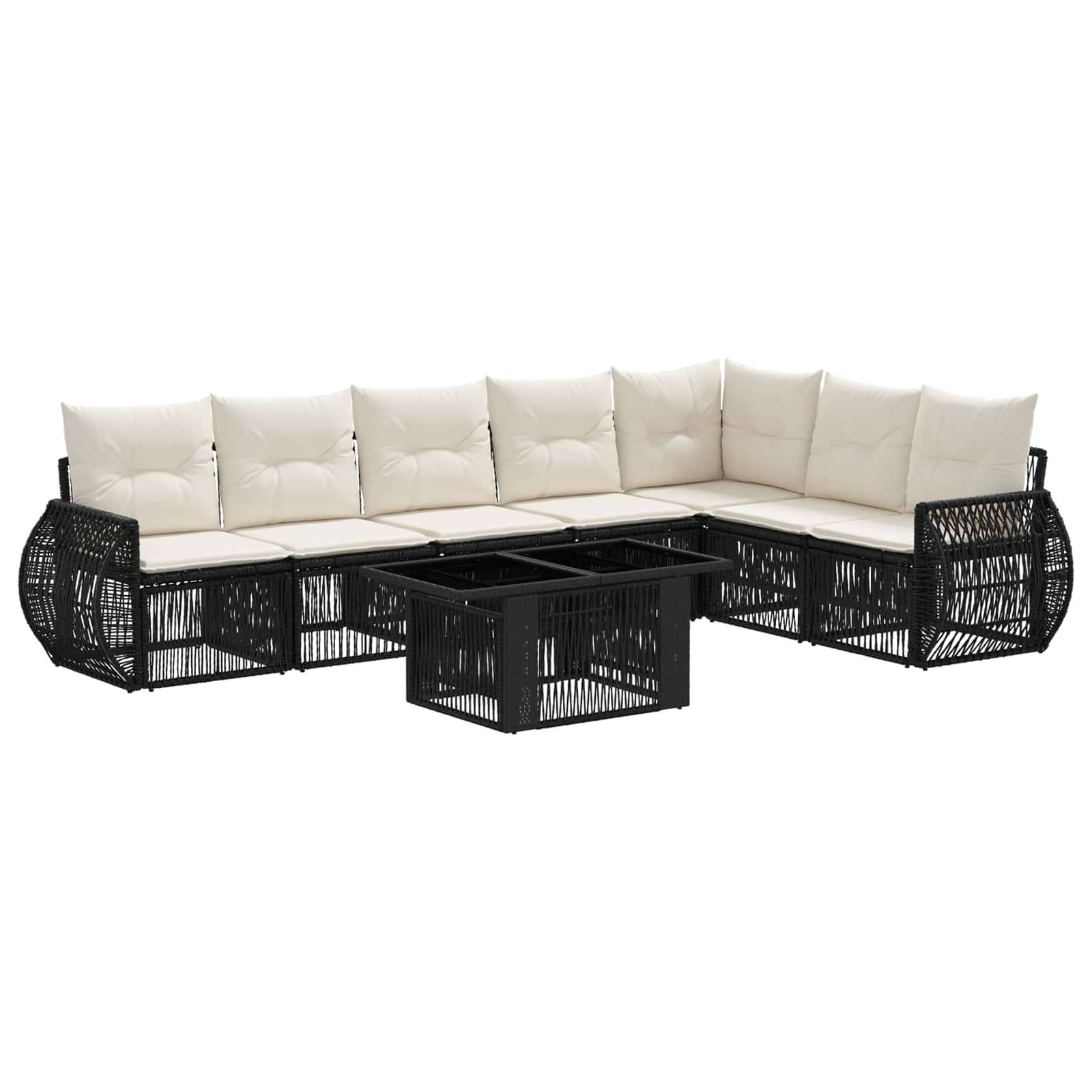 L-förmiges schwarzes Polyrattan-Patio-Ecksofa mit cremefarbenen Kissen und passendem Glastisch auf weißem Hintergrund.