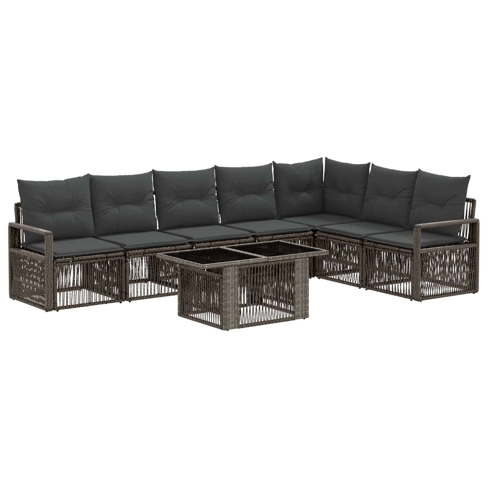 Outdoor-Loungegarnitur-Set mit dunklen Kissen, gewebtem Untergestell und passendem Glastisch auf weißem Hintergrund.