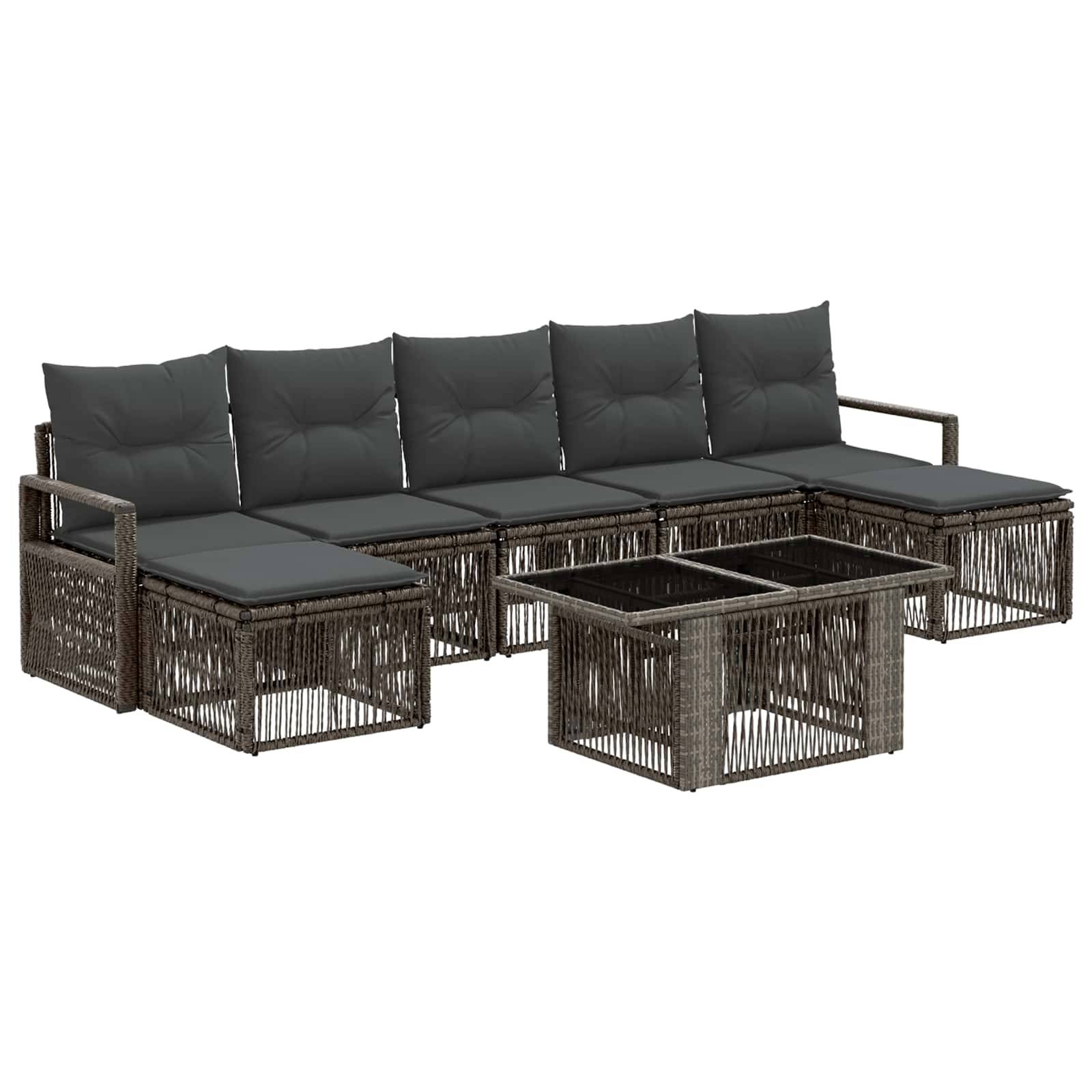 Sechsteiliges Outdoor-Terrassenelement-Set mit dunklen Rattanrahmen, grauen Kissen und passendem Glastisch auf weißem Hintergrund.