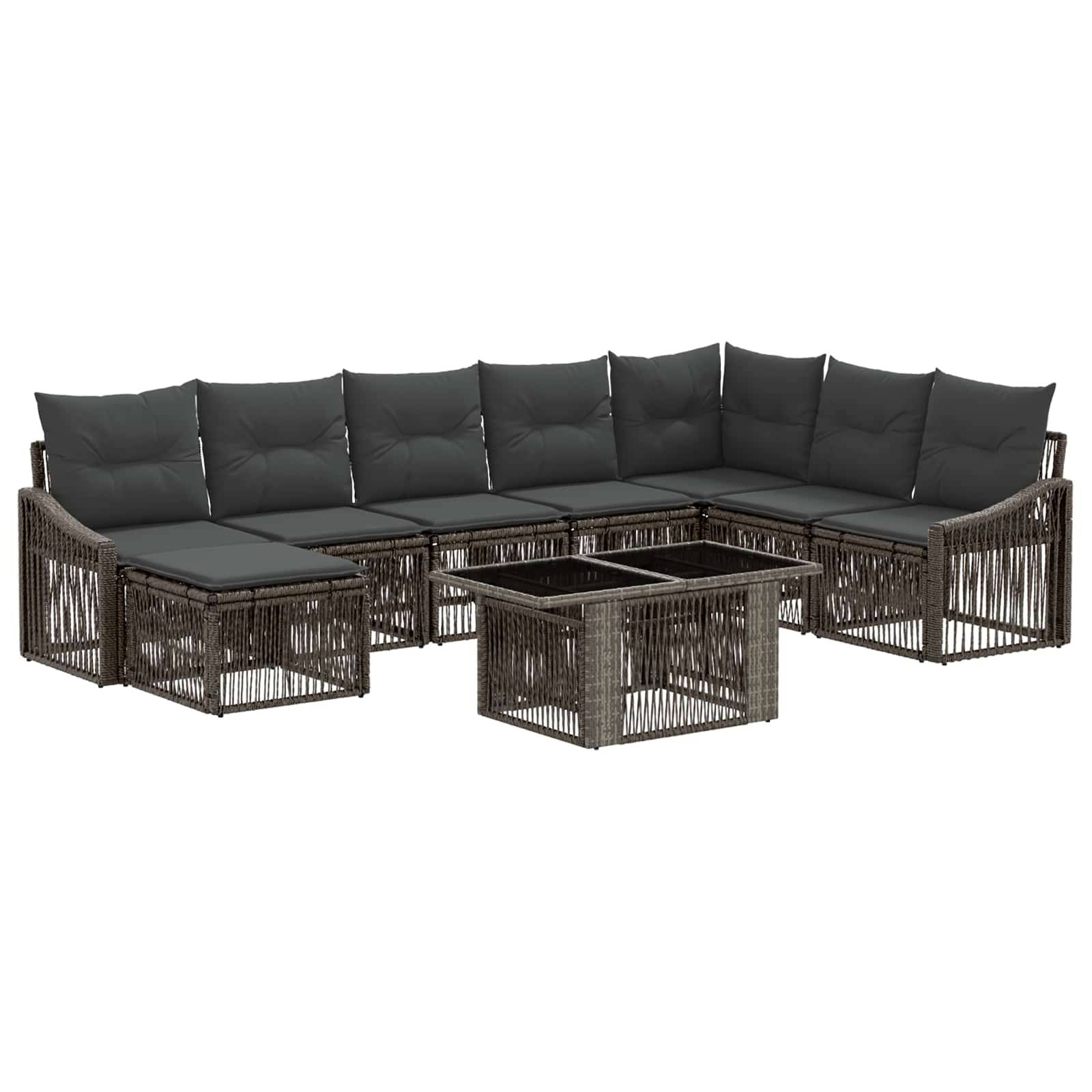 Modulares Outdoor-Terrassensofaset mit geflochtenen Rattanrahmen, dunklen Kissen und passendem Glastisch auf weißem Hintergrund