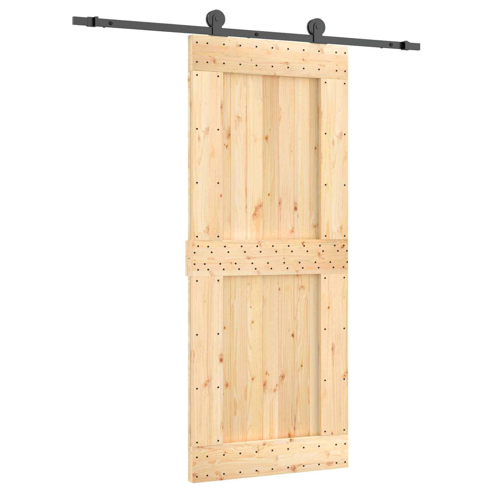 Ein leichtes Holz-Scheunentorpaneel auf schwarzem Schienenlaufwerk, von vorne gezeigt vor weißem Hintergrund.