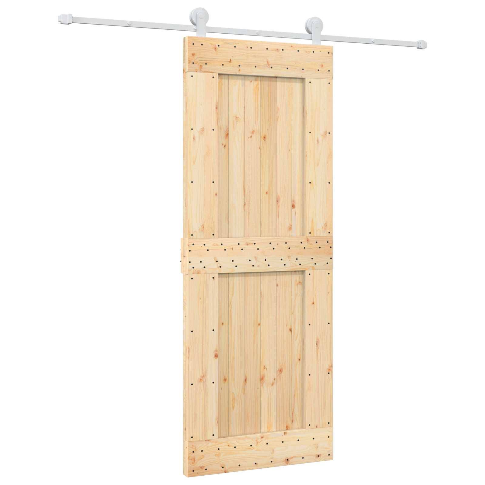 Holzernes Schiebescheunentor-Panel mit oberer Schienenhardware, isoliert auf weißem Hintergrund dargestellt.