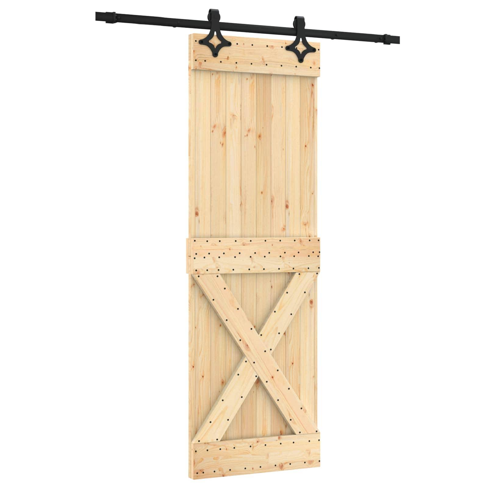 Holztür im Scheunenstil mit Schiebetür-Panel und X-Strebe-Detail, hängend von einer schwarzen Schiene.