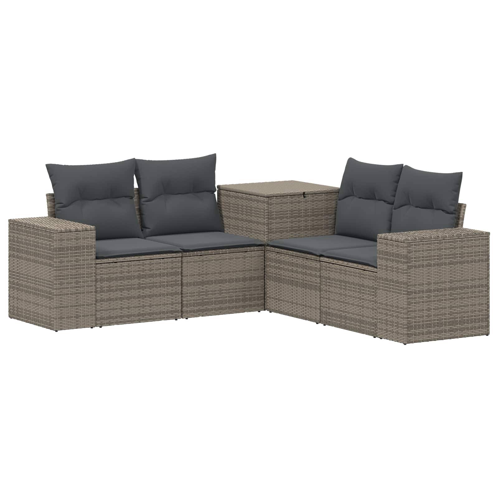 Grau geflochtenes Outdoor-Ecksofa mit dunklen Kissen und passendem Ecktisch