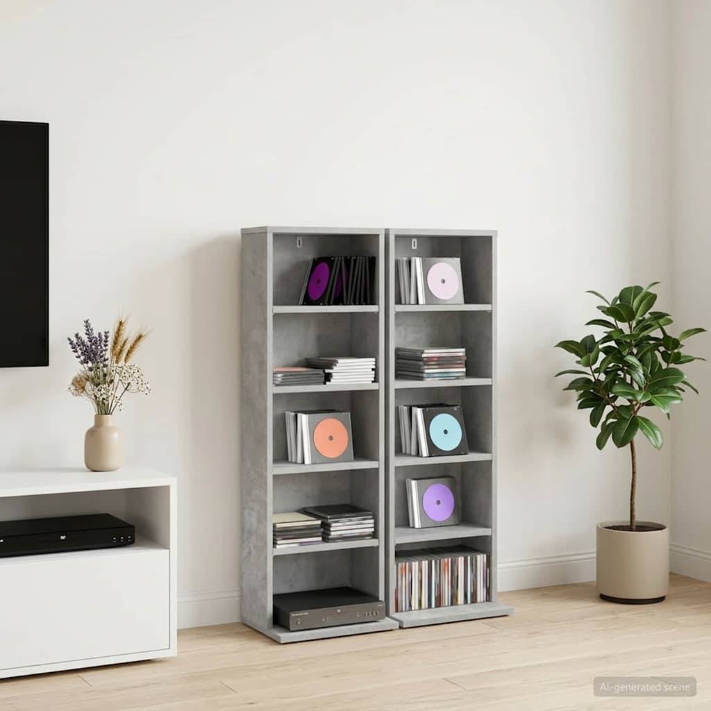 Modernes Zimmer mit zwei grauen Regalen für Schallplatten, einem Fernsehständer auf der linken Seite und einer Topfpflanze auf der rechten Seite.